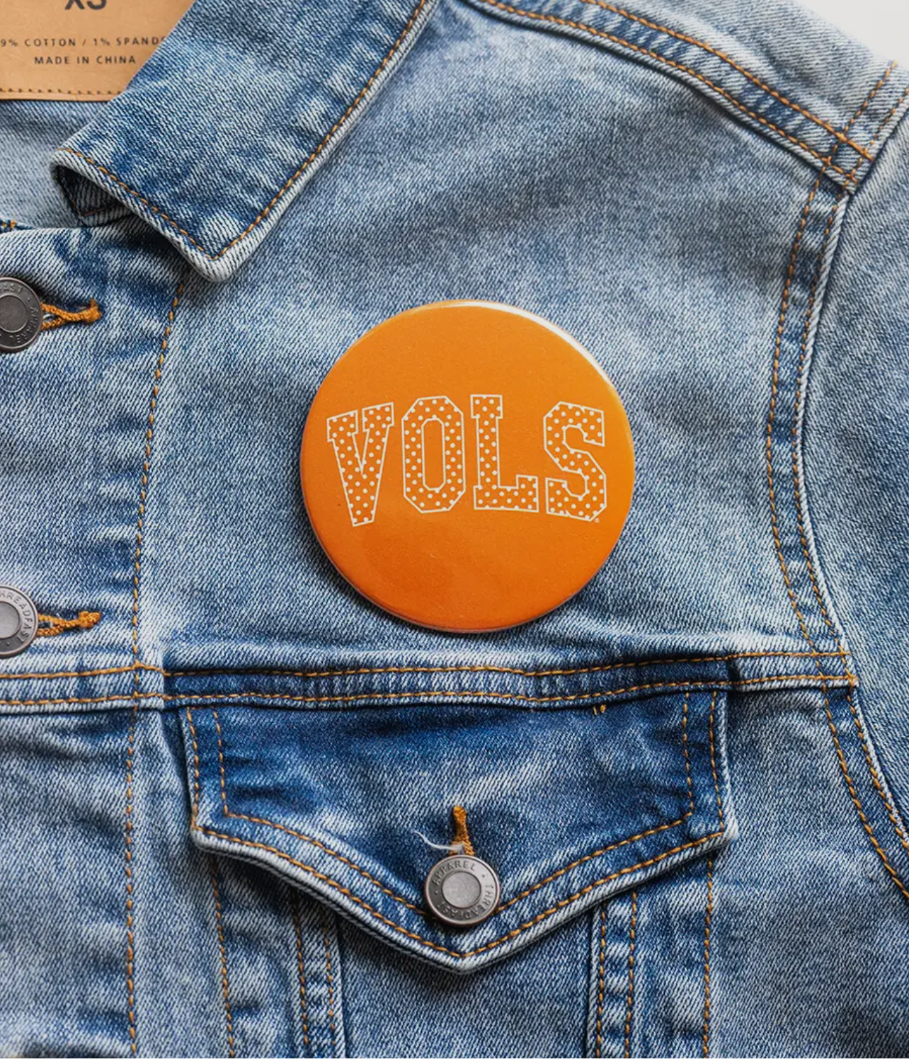 Vols Button